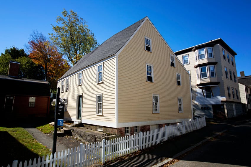 Color photograph of Gedney House yellow paint with white trim