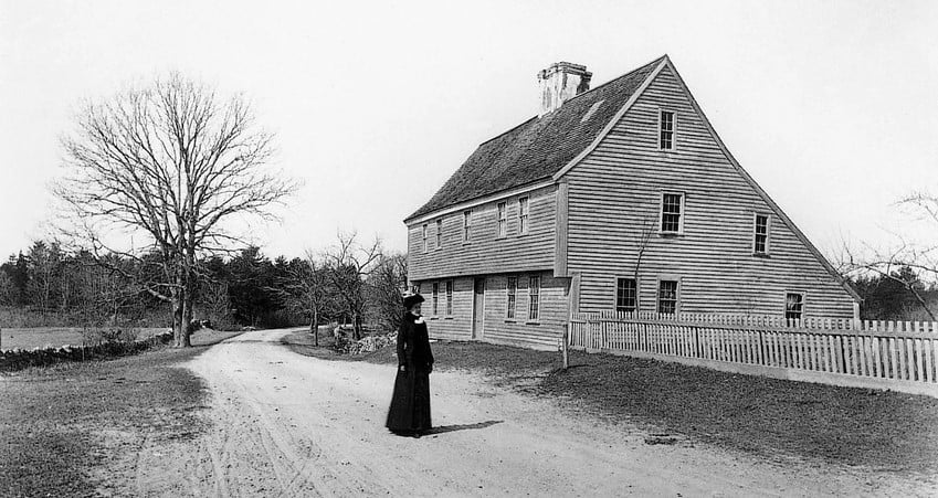 Black and white photo of Boardman House with woman in center