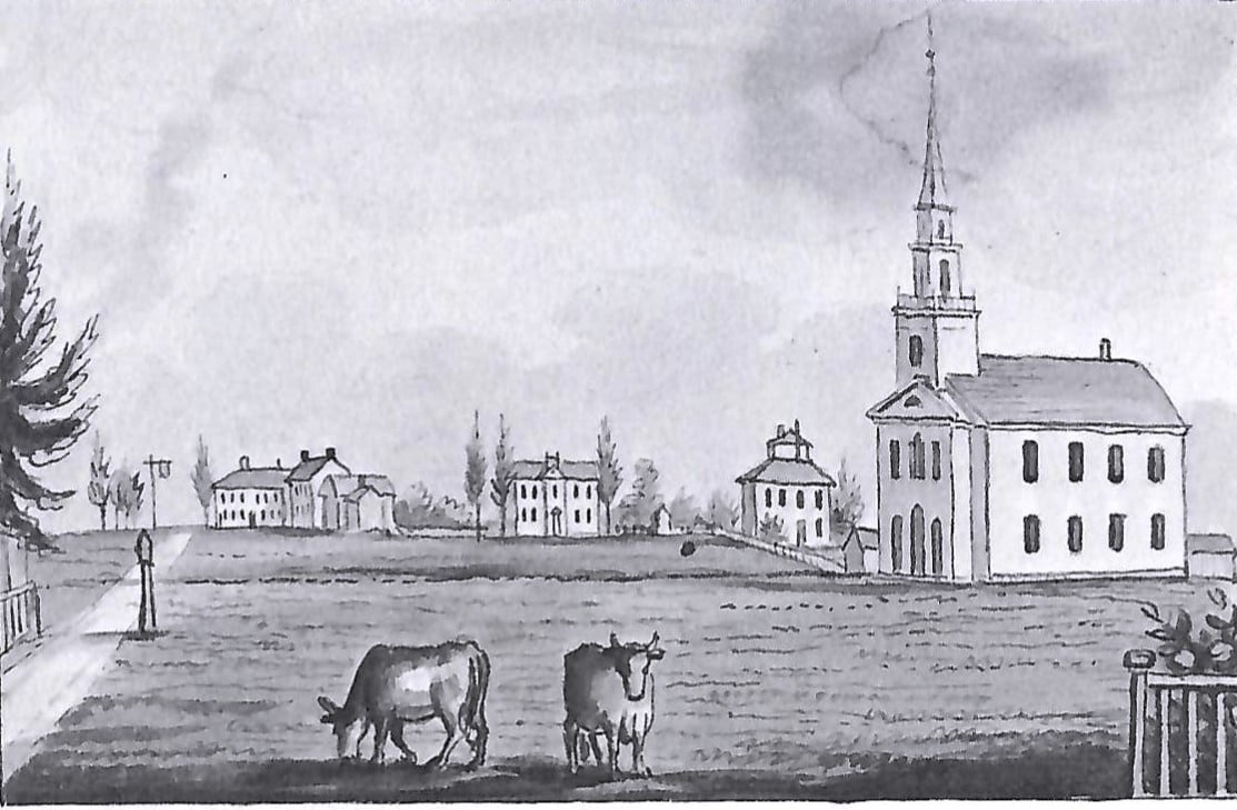 Print of Woodstock town common. Cows graze on central green with meeting house and other buildings.